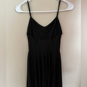 Black spaghetti strap dress criss cross in back.